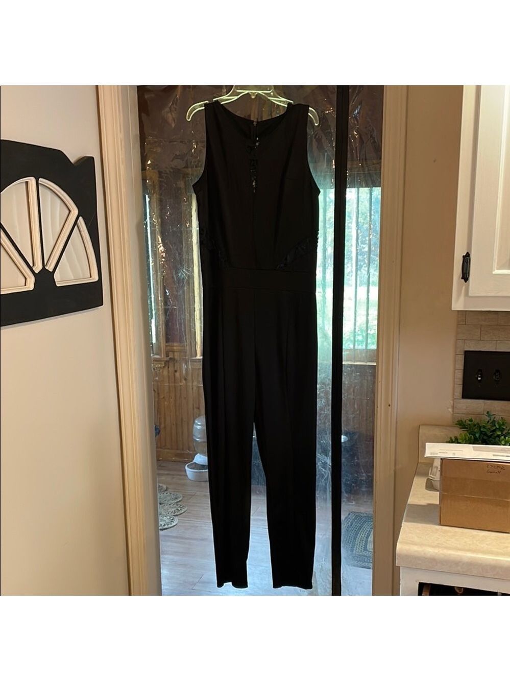Classic Fashion Collection, Sleek Black Sleeveless Jumpsuit with Straight Leg